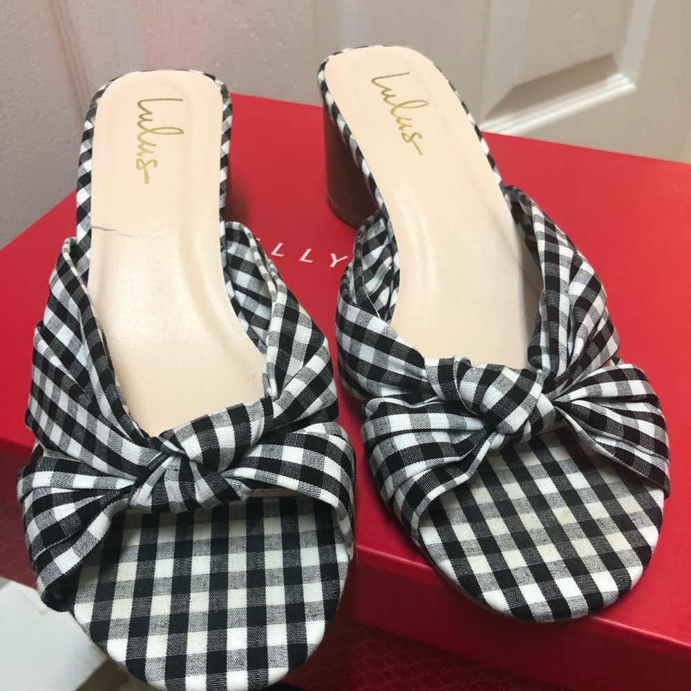 Gingham black and white slip on shoes.
